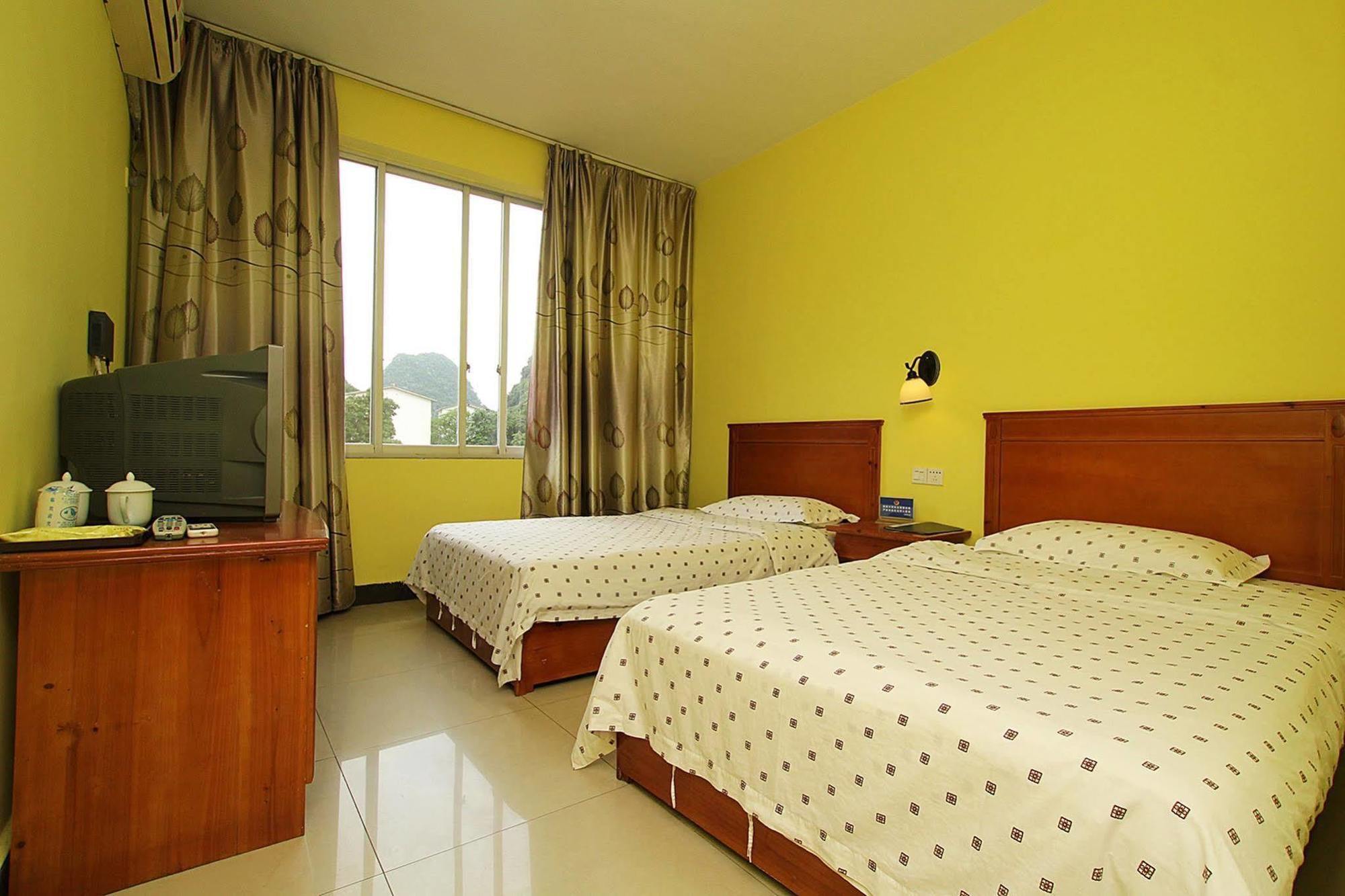 Yangshuo Travellers Land Youth Hostel Extérieur photo